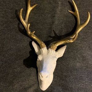 White deer head with gold antlers